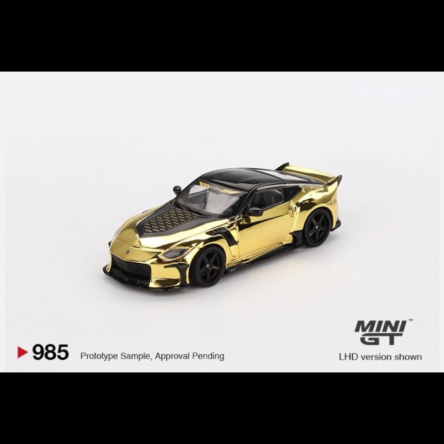 Mini Gt 985-Nissan Z VeilSide FFZ400 Gold Chrome